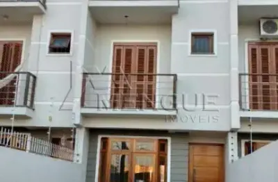 Casa com 3 quartos à venda na rua hugo nelson magalhães, 139, parque santa fé, porto alegre por r$ 485.000