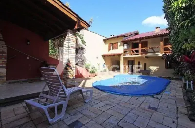 Casa com 3 quartos à venda na rua francisca lechner, 343, parque santa fé, porto alegre por r$ 650.000