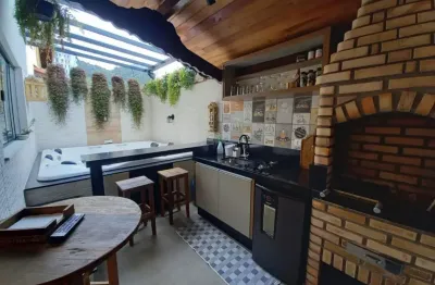 Sobrado com 3 dormitórios à venda, 175 m² por R$ 1.360.000,00 - Canto do Forte - Praia Grande/SP