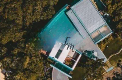 Condomínio Iporanga Casa com 6 dormitórios à venda, 695 m² por R$ 14.000.000 - Iporanga - Guarujá/SP