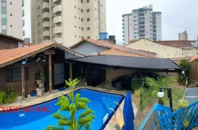 Belíssima casa térrea de madeira com piscina, hidro, churrasqueira, sauna venda 50 metros da praia mar em mongaguá.