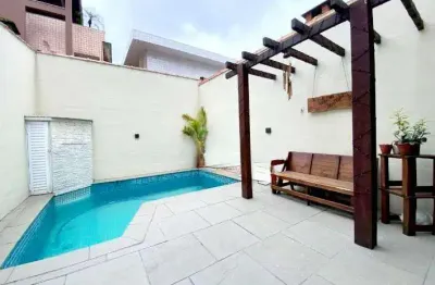 Sobrado triplex com 4 dormitórios, piscina e churrasqueira na aparecida – santos/sp