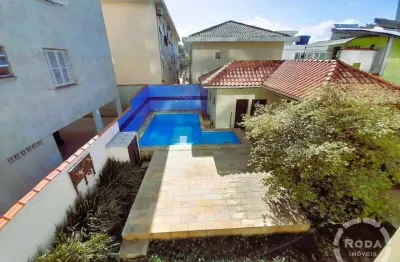 Sobrado à venda na aparecida | 4 dormitórios, piscina, 3 vagas de garagem e próximo da praia!