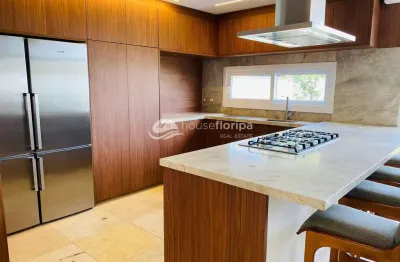 Casa mobiliada de 5 dormitórios em condomínio fechado à venda no campeche - conforto, elegância e p