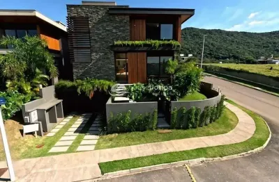 Casa pátio lagoa – uma residência de 607 m² com 4 suítes, piscina e arquitetura sofisticada na lago