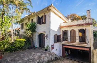 Casa com 5 quartos à venda na rua professor ivo corseuil, 129, petrópolis, porto alegre por r$ 1.350.000