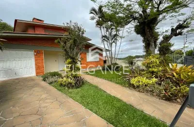 Elegance imóveis vende ótima casa com 350 m2  privativos 3 dormitórios suíte, terreno 20 x 50, garagem 6 carros. bairro rio branco cachoeira do sul