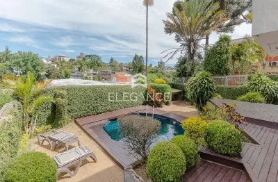 Casa com 5 quartos à venda na rua felipe becker, 250, três figueiras, porto alegre, 450 m2 por r$ 1.890.000