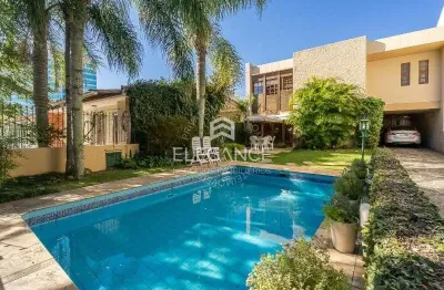 Elegance imóveis vende casa, 400m, 3 dormitórios, 1 suíte, living de 3 ambientes, pátio com piscina e 4 vagas de garagem/box. comprar r$ 2.790.000,00
