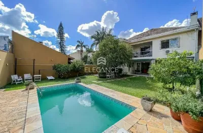 Elegance imóveis vende ótima residência com 362 m2, 4 dormitórios , 3 suítes, piscina,  com 2 vagas garagem. chácara das pedras porto alegre.