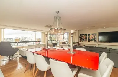 Luxuoso apartamento de 3 quartos e 3 suítes no Rio Branco, Porto Alegre-RS: 5 banheiros, 3 vagas de garagem e 275m² de área.