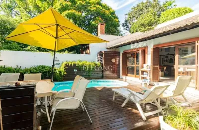 Luxuosa casa de 4 suítes à venda em chácara das pedras, porto alegre-rs: 575m2, 7 banheiros, 5 vagas. elegance imóveis