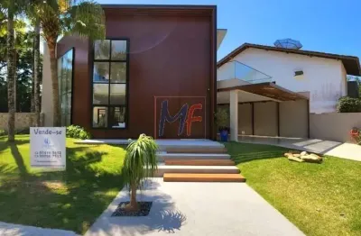 Ref: 17.010 excelente casa de alto padrão localizada na riviera praia , 427 a.c, 522 m² a.t, sendo 5 suítes, 5 vagas. amplo espaço gourmet!