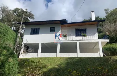 Excelente casa em cond. fechado  campos do jordão, com 96 m² a.u., terreno 1.244 m2  ,  mobiliado , 2 dormitórios (1 suíte), sala, cozinha, varanda e vaga  (ref 19.518)