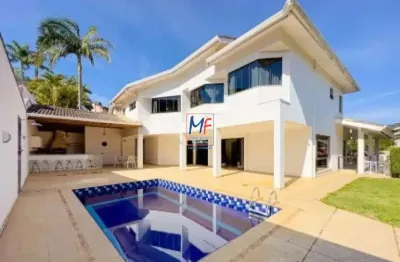 Excelente casa em cond. fechado no alphaville, em santana de parnaíba/sp, 500m² a.u., 5 dormitórios (5 suítes), piscina, 3 vagas (ref 19.472)