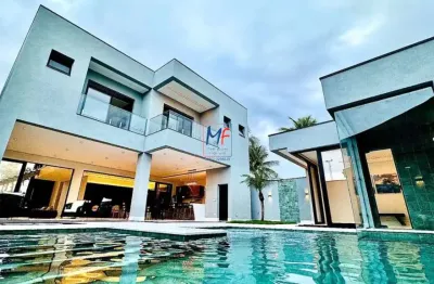 Excelente casa no condomínio jd. acapulco , mobiliado , com 525 m²  a.c., 5 dorms., (sendo 5 suítes), 7 banheiros, totalmente mobiliada, 4 vagas de garagem. ref: 19.984