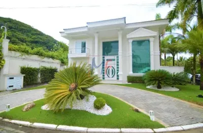 Excelente casa em condomínio fechado no bairro balneário praia do pernambuco - guarujá, sendo 5 suítes, 5 vagas, 489 m². ref: 13.286