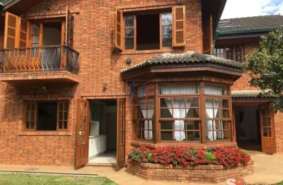 Ref 16.282 linda casa em  condomínio fechado  , 568 m²  a.u. , mairiporã ,4 suítes, sala 3 ambientes, lareira, piscina, área gourmet e 3 vagas.