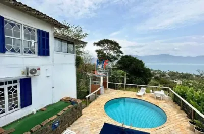 Excelente casa região central de ilhabela sp,  320 m² a.c., 1.470 m² a.t., 6 suítes, lareira, piscina, vista para o mar (ref 20.619)