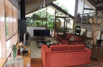Ref 11.354 casa moderna condomínio florestal clube, sendo 4 suíte, sala de estar com lareira, living, 4 vagas, 400 m² a.c. 2800 m² de terreno