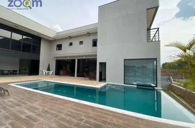 Casa nova em condomínio alto padrão com 5 suítes à venda, 695 m² por r$ 4.300.000