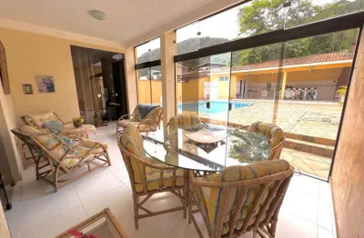 Sobrado com 5 dormitorios a venda por r$ 1.650.000,00 - guaiuba - guaruja/sp