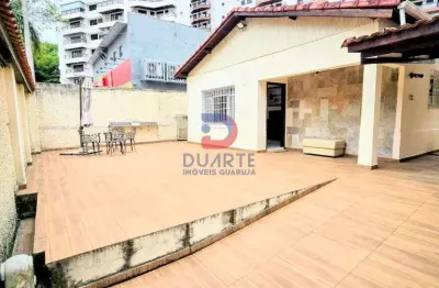 Casa com 3 suites, ampla area externa e terreno de duas frentes – entre as praias das asturias e do tombo – guaruja/sp
