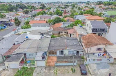 Casa com edícula de frente para rua à venda, com 3 quartos sendo 1 suíte, no bairro xaxim, curitiba/pr.