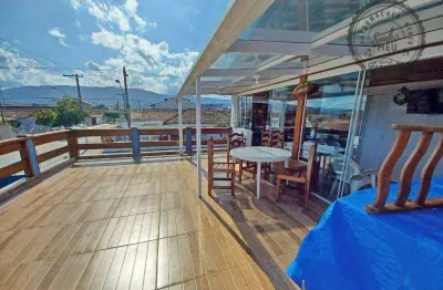 Sobrado com 3 dormitórios à venda, 142 m² por r$ 690.000,00 - maracanã - praia grande/sp