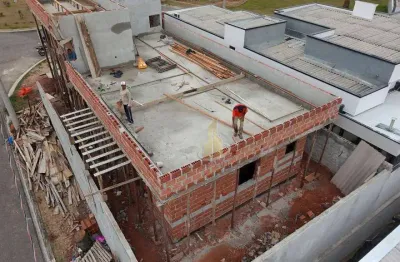 Casa com 3 dormitórios à venda, 128 m² por R$ 862.000 - Condomínio Malibu - Caçapava/SP