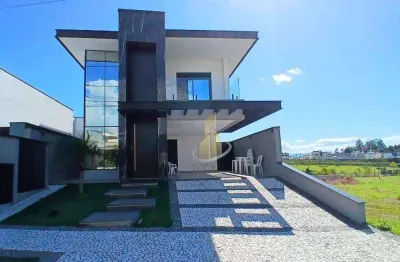 Sobrado com 3 dormitórios à venda, 285 m² por R$ 1.850.000 - Condomínio Malibu - Caçapava/SP