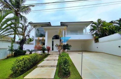 Casa à venda no condomínio jardim acapulco no guarujá | omega imóveis
