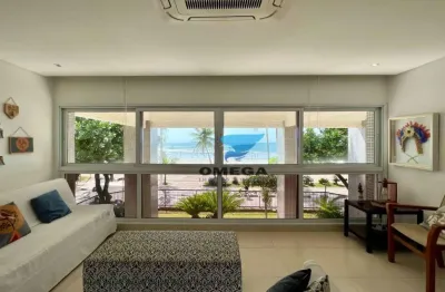Frente ao mar à venda na praia das astúrias, apartamento com linda vista mar reformado em porcelanato.