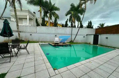 Casa à venda em condomínio de alto padrão no guarujá | omega imóveis