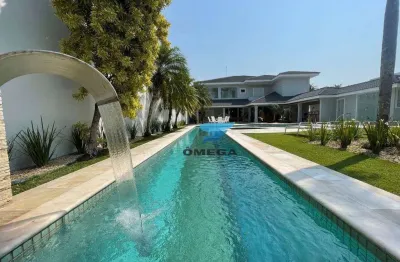 Casa à venda no condomínio jardim acapulco no guarujá | omega imóveis
