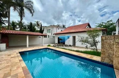 Casa à venda em condomínio jardim acapulco no guarujá | omega imóveis