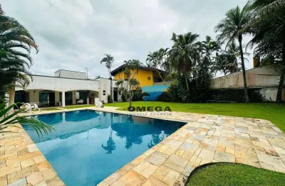 Casa à venda em condomínio jardim acapulco no guarujá | omega imóveis