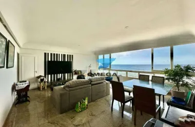 Apartamento reformado frente mar à venda na praia das pitangueiras no guarujá i omega imoveis