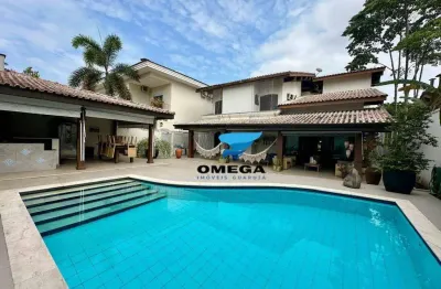 Casa à venda em condomínio jardim acapulco no guarujá | omega imóveis
