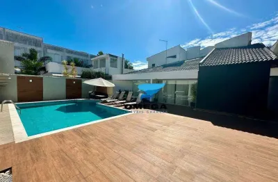 Casa à venda no condomínio jardim acapulco no guarujá | omega imóveis