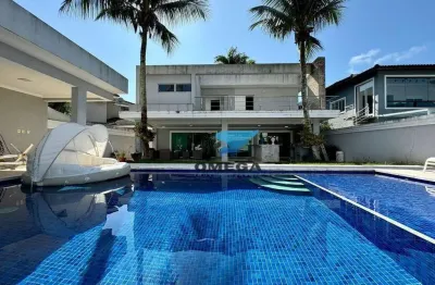 Casa à venda no jardim acapulco no guarujá | omega imóveis