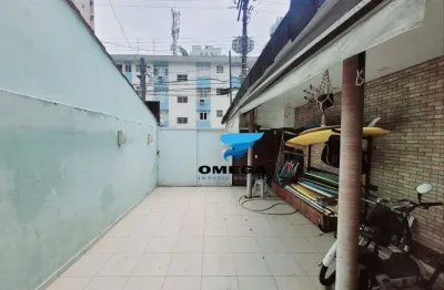 Casa à venda na Praia das Pitangueiras - Guarujá SP / Omega Imóveis