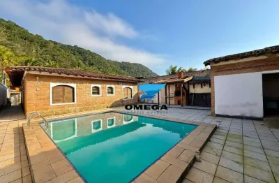 Casa com 4 quartos à venda na Rua Gerônimo Lopes Agria, 523, Jardim Guaiuba, Guarujá