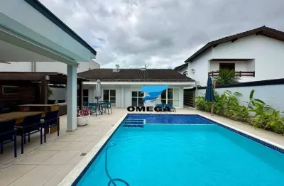 Casa à venda em condomínio jardim acapulco no guarujá | omega imóveis