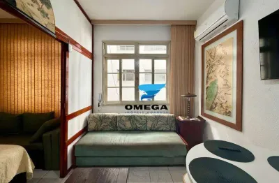 Kitnet à venda na praia das pitangueiras no guarujá i omega imoveis