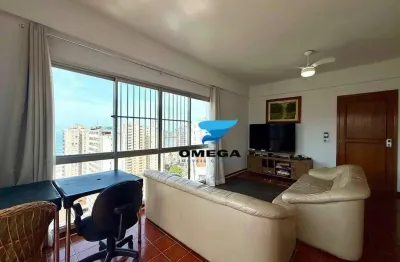 Apartamento com vista parcial para o mar à venda na praia das pitangueiras no guarujá i omega imoveis
