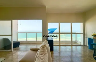 Apartamento beira mar à venda na praia das pitangueiras no guarujá i omega imoveis