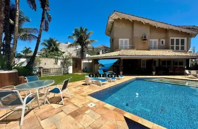 Casa de alto padrão à venda em condomínio jardim acapulco no guarujá | omega imóveis