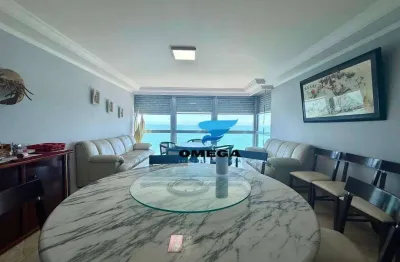 Apartamento beira mar à venda na praia das Pitangueiras no Guarujá I Omega Imoveis