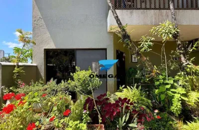 Casa à venda em condomínio fechado na praia das pitangueiras no guarujá i omega imoveis